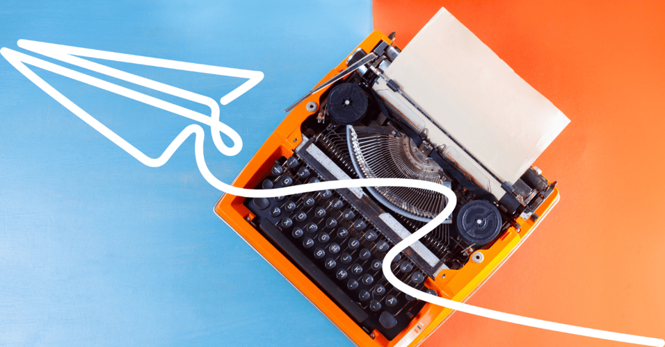 Type writer against blue and orange background 
