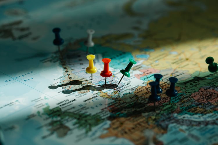 World map with pins on it