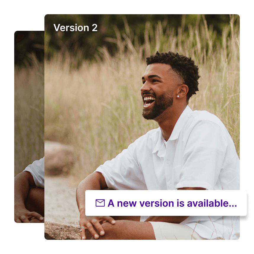 A man sat in a meadow with a message